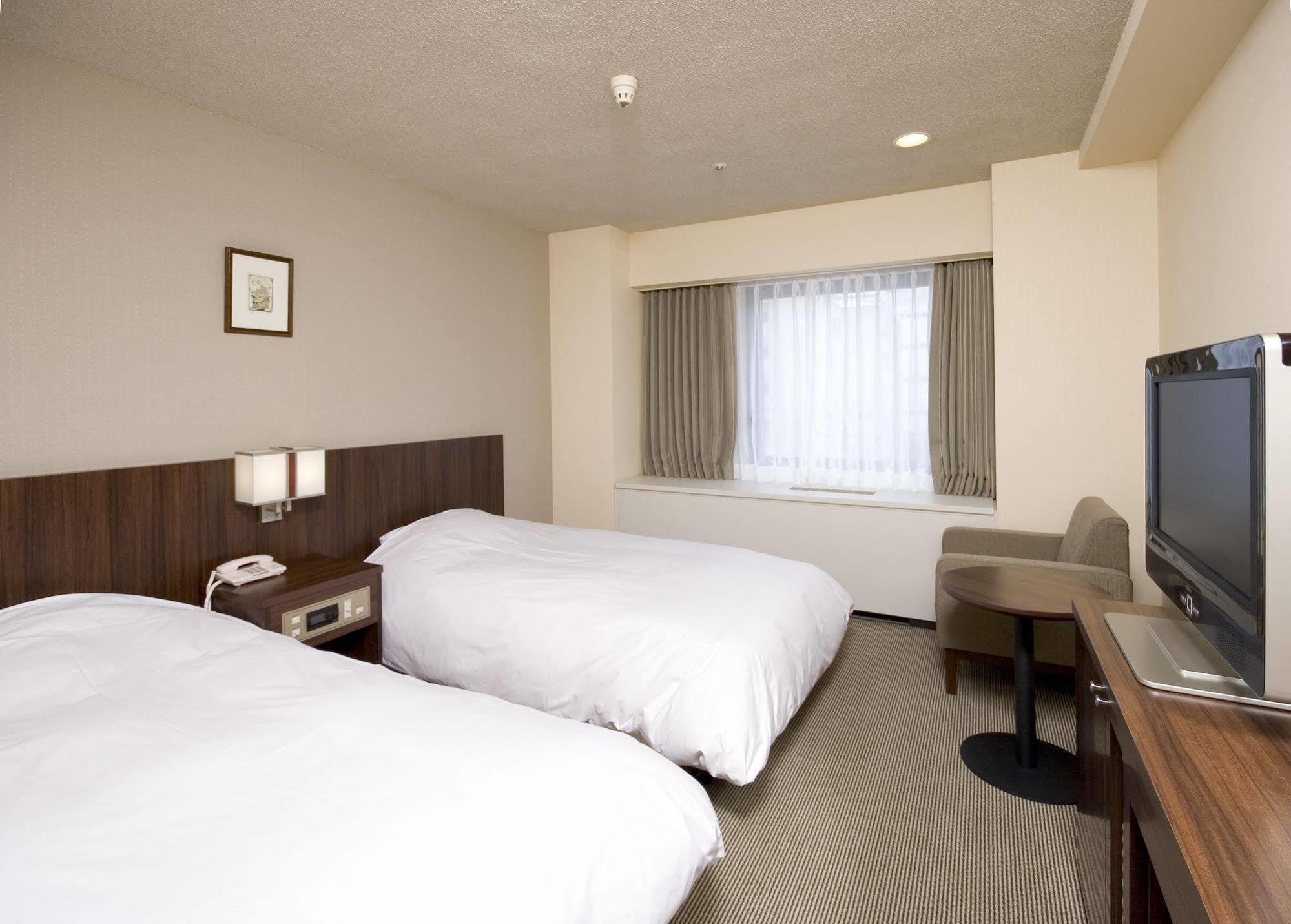 Hotel Sunroute New Сапоро Екстериор снимка